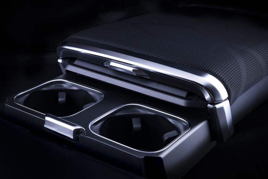 Armrest with cupholder